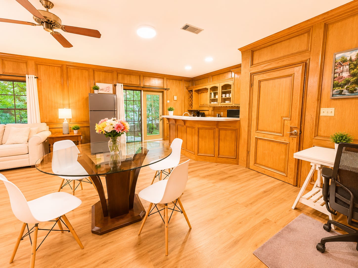 Dining table and kitchen bar in a furnished Westlake Hills studio apartment